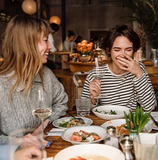 Group of friends enjoying dinner together